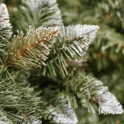 Snow Covered Christmas tree, with real natural cones, white snow, and silver crystals