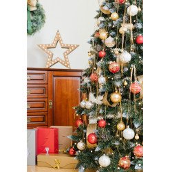 Snow Covered Christmas tree, with real natural cones, white snow, and silver crystals