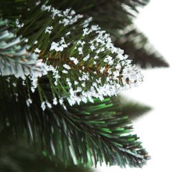 Snow Covered Christmas tree, with real natural cones, white snow, and silver crystals